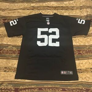 Sport station . NFL jersey , young boys . size 18 /20 black and gray # 52